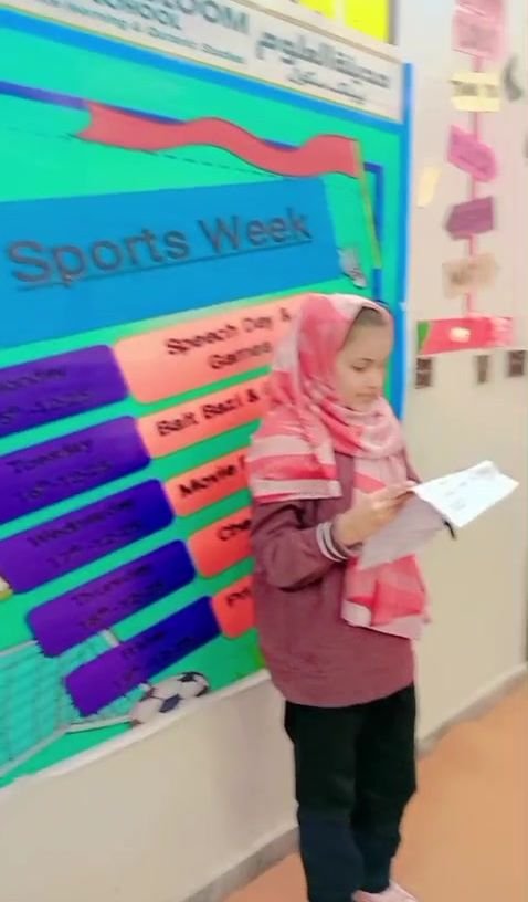 Student giving a speech during Sports Week