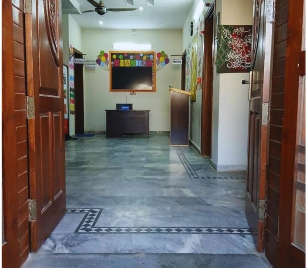 Main entrance corridor with reception and principal’s office